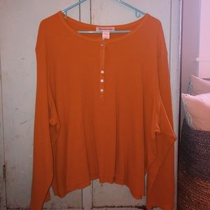 orange-yellow button up henley top